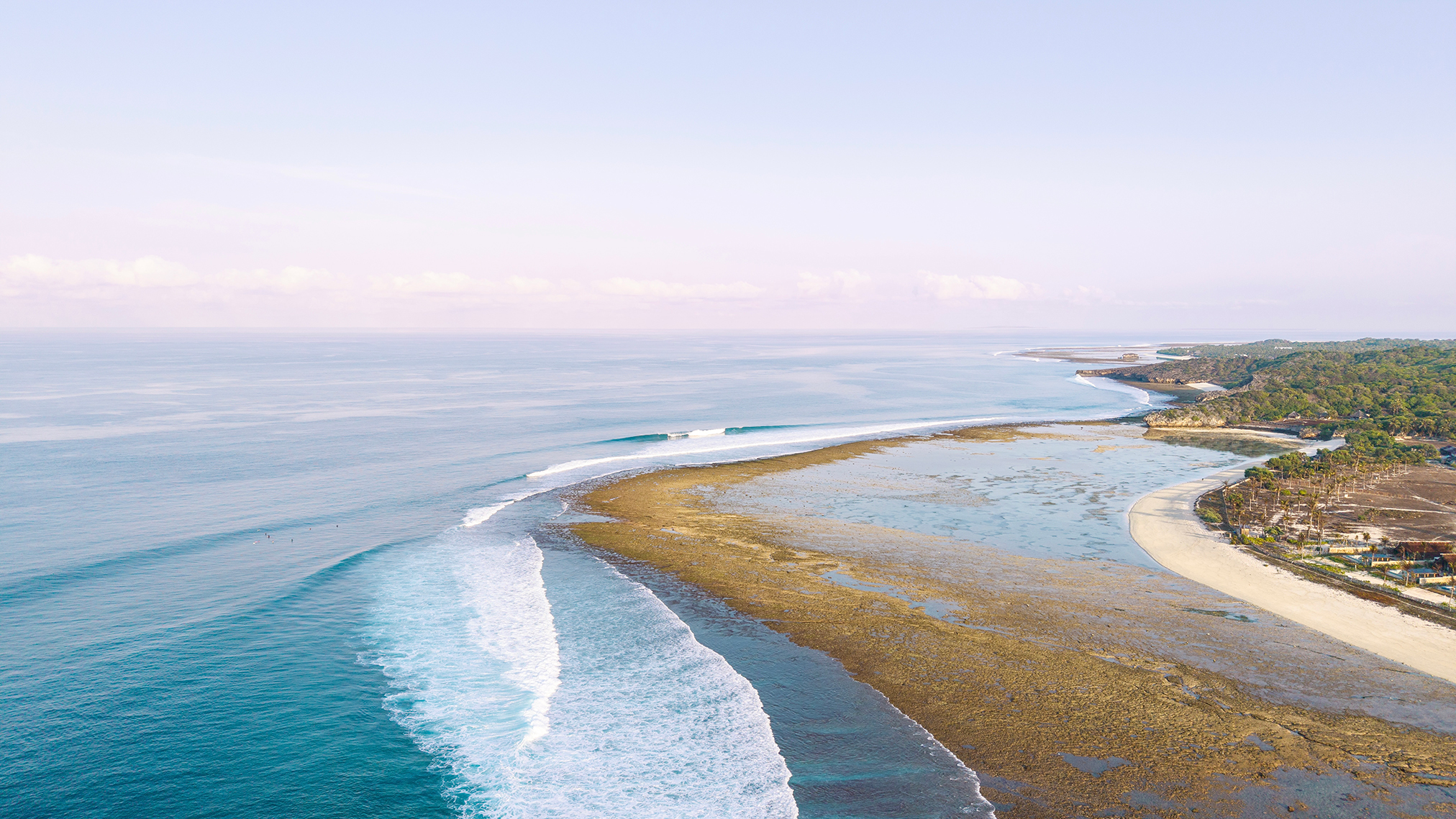 Drone photography of Boa wave and reef at a morning sunrise